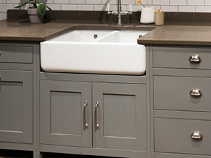 Apron front sink